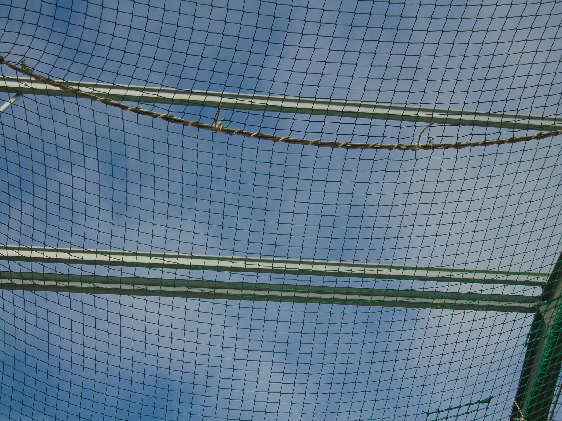 Editorial cover image for article on rope access alongside safety netting on complex structures